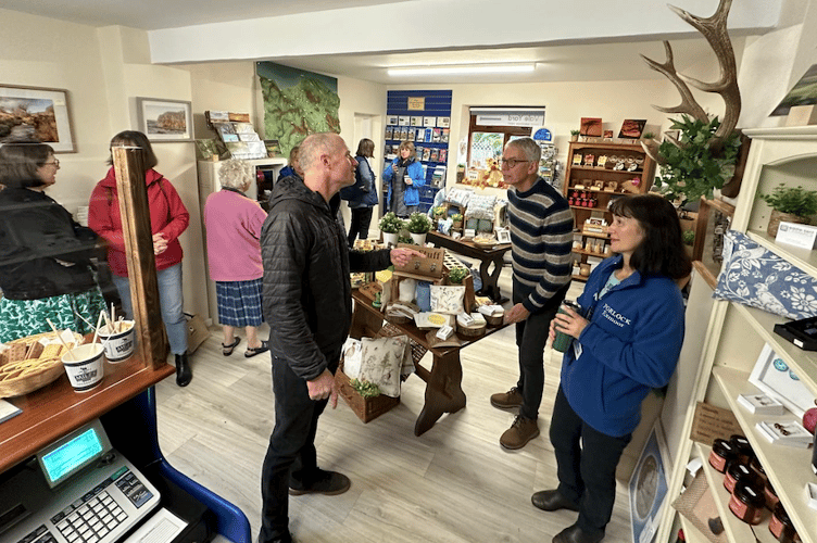Visitors and staff in Porlock Information Centre's new premises.