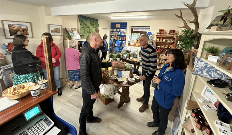 Visitors and staff in Porlock Information Centre's new premises.