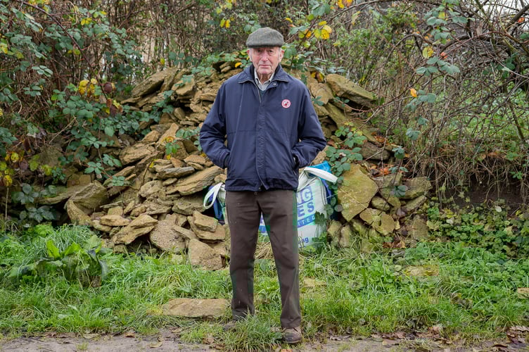 Grandfather, Ron Knight could be forced to sell his house due to the on going fines associated with a six-year planning dispute over a wall that he helped build in the 70's in Milborne Port, captured on the 29th November 2023. See SWNS story SWLNwall. A farmer has vowed to 'die in prison' rather than pay fines for knocking down a boundary wall he helped build 50 years ago.Ron Knight, 88, has faced six years of a 'living nightmare' since receiving a planning enforcement notice from the council for removing part of a concrete wall to allow access to his land.He had built it himself in 1973 but when he took part of it down in 2017 he was told it was 'historic', in a 'conservation' area and he needed planning permission.After missing the deadline to appeal, the pensioner has now been in court four times and racked up thousands of pounds in fines he said they can not afford to pay.
