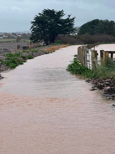 The Steam Coast Path in Dunster experienced severe flooding during Storm Bert
