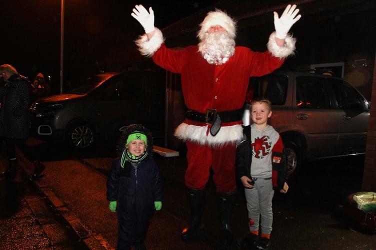 Father Christmas was guest of honour to switch on the festive lights in Minehead's Plover Close. PHOTO: George Ody.