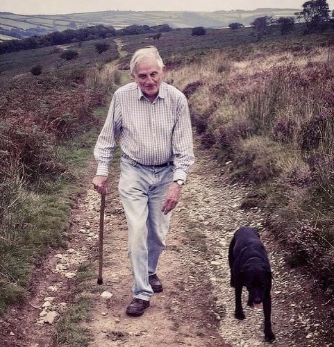 Walter Godsal walking his dog
