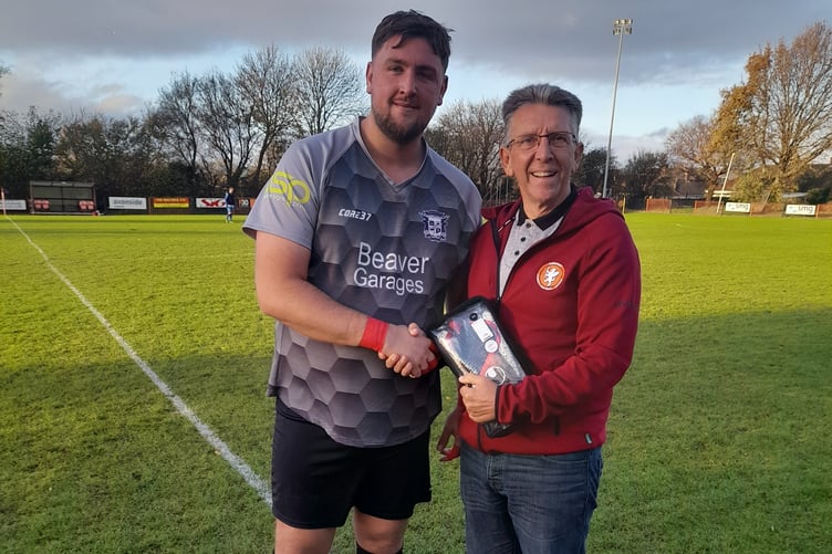 Kyran Wilkins receives his Goalkeeper of the Month award for November