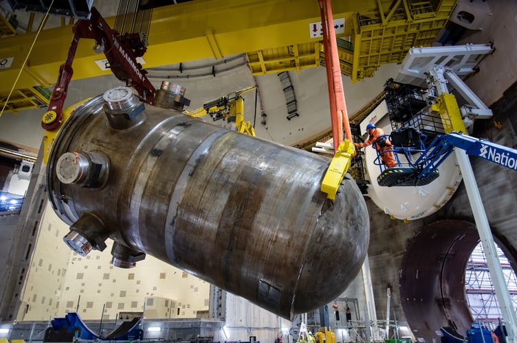 Workers building the £26bn Hinkley Point C nuclear power station have installed Britainâs first new nuclear reactor for more than 30 years. The first of two 13m long âreactor pressure vesselsâ will produce enough energy alone to generate reliable low carbon electricity for 3m homes. With two units, the power station will provide Britain with 7% of its electricity. This major milestone comes less than 12 months after the huge steel dome was lifted in place to close the reactor building at the Somerset facility. The reactor is the first to be installed at a British power station since Sizewell Bâs in 1991. Energy Secretary Ed Miliband said: âInstalling the first reactor pressure vessel at Hinkley Point C is a significant feat of engineering and a major step forward for the UKâs most advanced nuclear project.