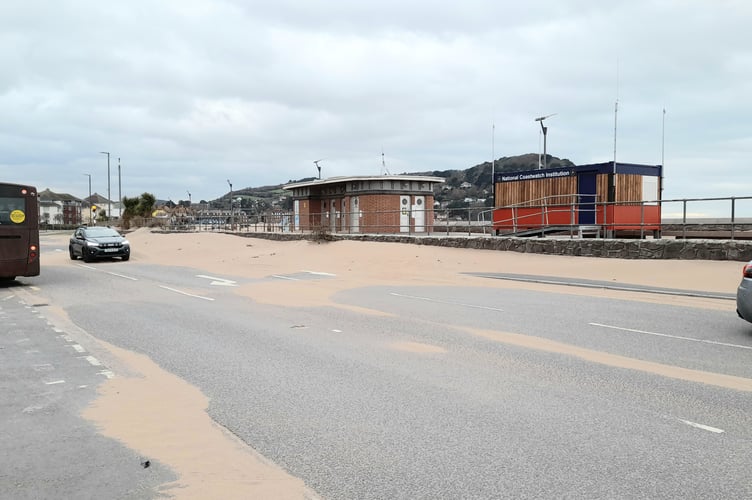 Tons of sand has been blown onto Warren Road, Minehead seafront