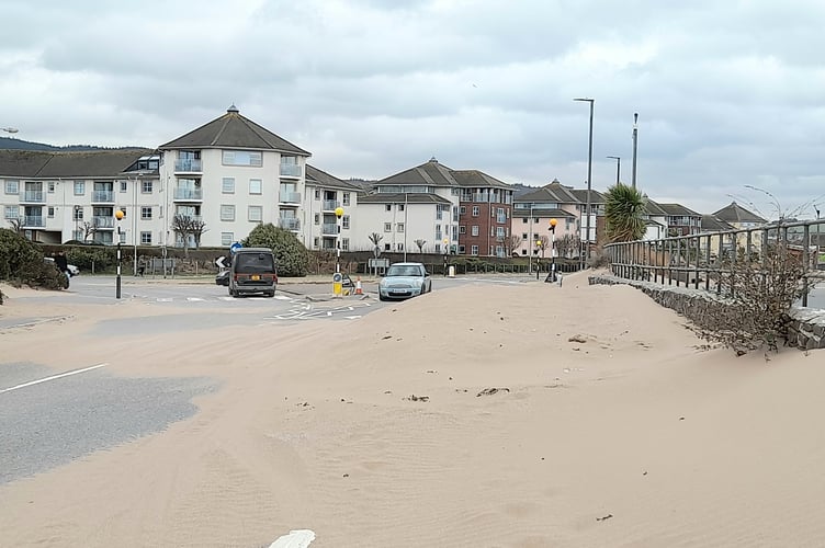 Tons of sand has been blown onto Warren Road, Minehead seafront