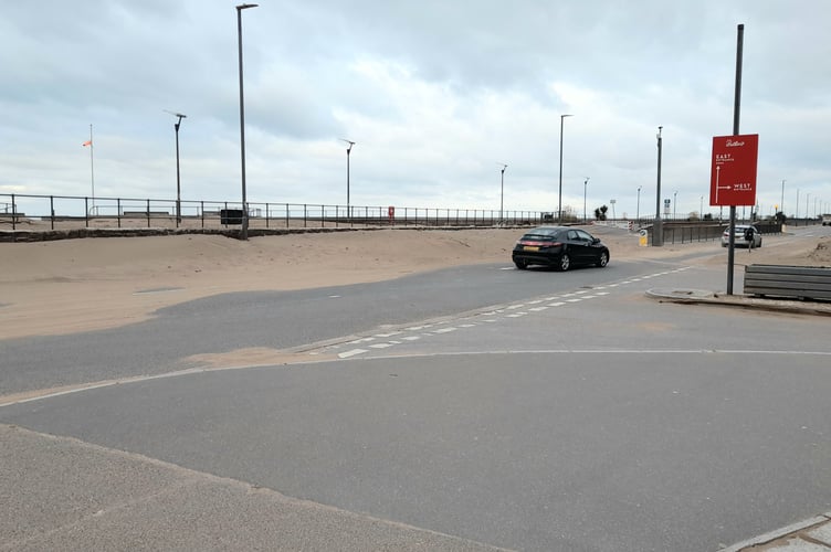 Tons of sand has been blown onto Warren Road, Minehead seafront