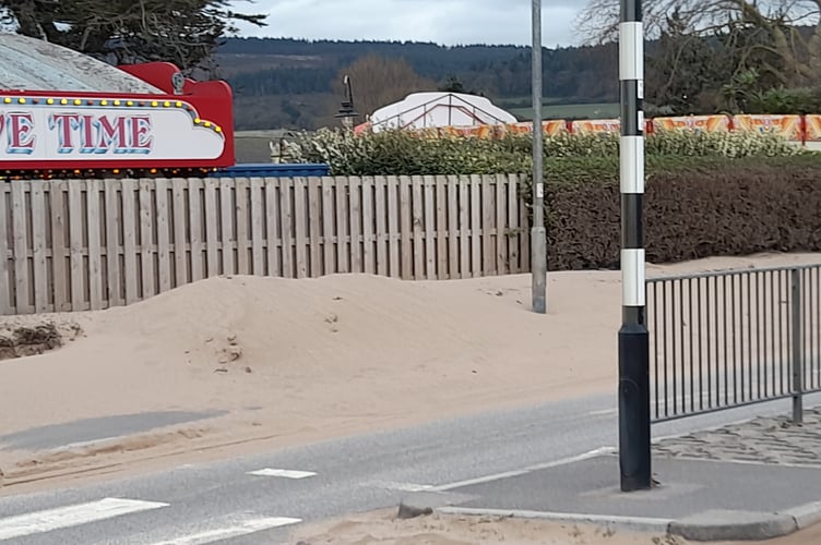 Tons of sand has been blown onto Warren Road, Minehead seafront