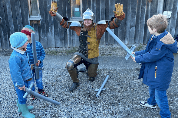 A Wessex Medieval Alliance knight yields during Dunster Winter Festival. PHOTO: Nina Dodd.