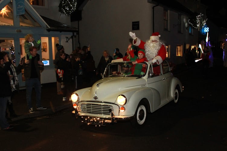 Father Christmas and his elves make a special arrival in Watchet for a late night extravaganza of festive fun and shopping. PHOTO: George Ody.