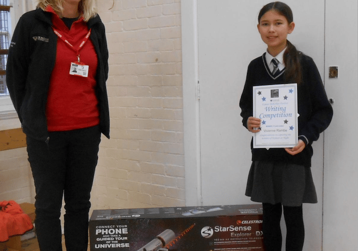 Exmoor Dark Skies Festival children's writing competition winner Vivienne Rambe with park authority rural enterprise co-ordinator Julie Colman. PHOTO: ENPA.