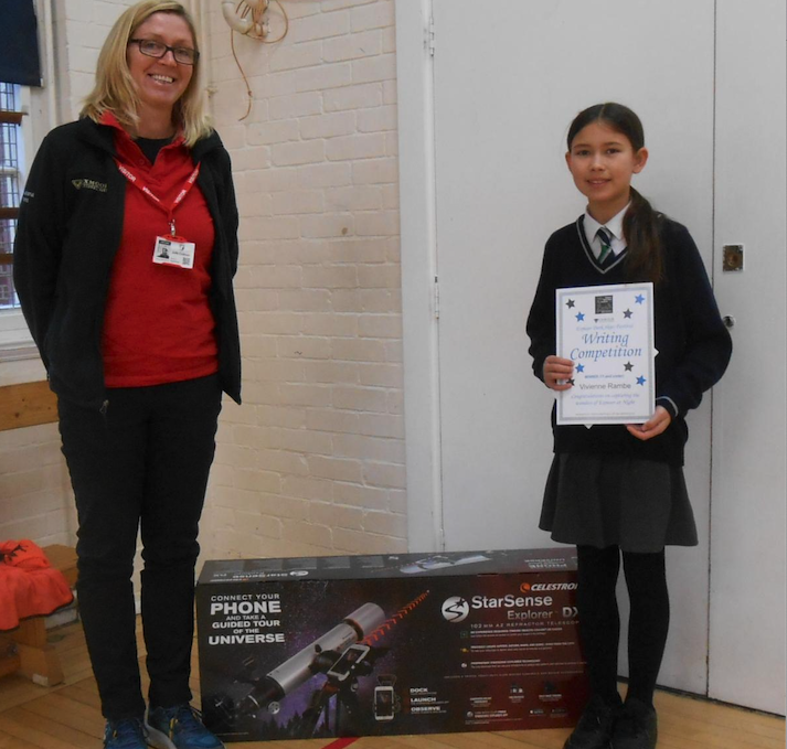 Exmoor Dark Skies Festival children's writing competition winner Vivienne Rambe with park authority rural enterprise co-ordinator Julie Colman. PHOTO: ENPA.