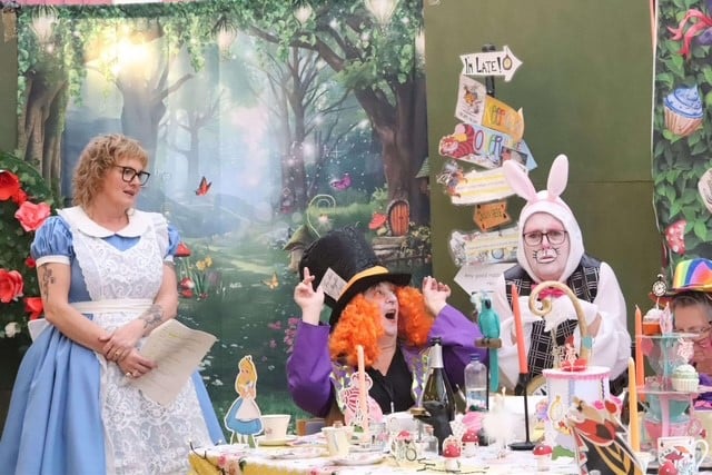 Dr Clare Nettleton as Alice, with Mad Hatter June Lewis and White Rabbit Tracey Bland in Williton Hospital's pantomime. PHOTO: Ben Bland Photography.