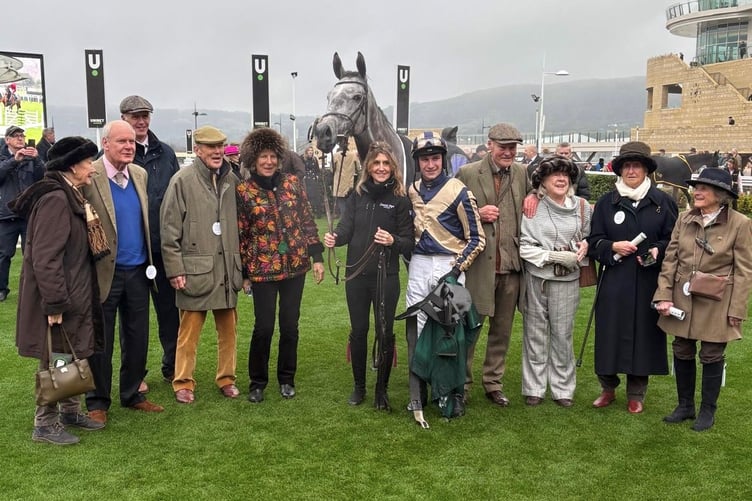 King Turgeon in the winners enclosure at Cheltenham with jockey Jack Tudor and winning connections