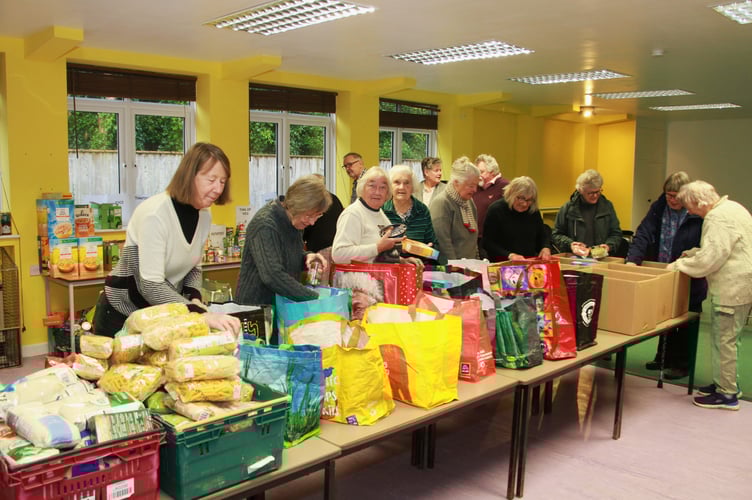 Food parcels being prepared by volunteers and trustees of Moorland Foodbank, Dulverton. PHOTO: George Ody.
