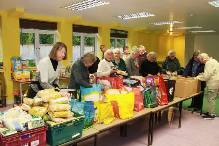 Food parcels being prepared by volunteers and trustees of Moorland Foodbank, Dulverton. PHOTO: George Ody.