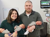 Xmas comes early for 'overjoyed' couple as identical triplets are born