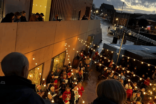 A previous Christmas singalong at East Quay, Watchet.