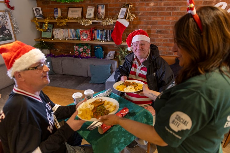 Christmas meals are being provided for the homeless by NatWest customers through charity Social Bite. Pictured are (left to right) Billy, Jim, and Social Bite team member Ambreen.