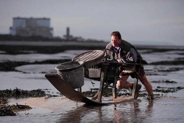 Adrian Sellick on his mud horse near Hinkley Point.