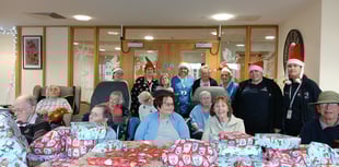 Care group colleagues and residents help food bank