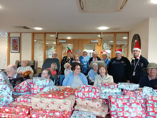 Care group colleagues and residents help food bank