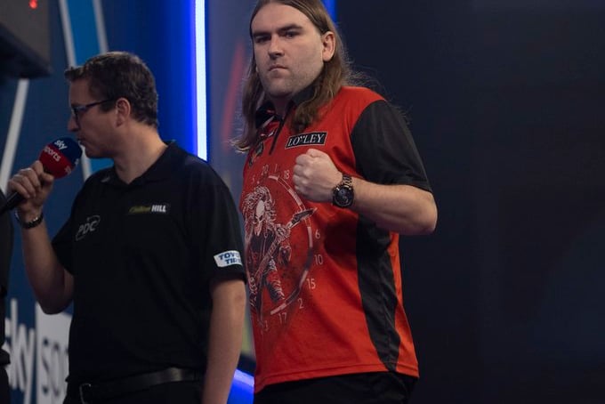 Searle loses in World Darts Championships