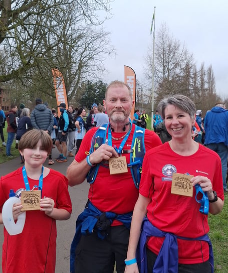 Darcey Curran with dad Mark and mum Jack after the Channel UK Events community canal run.