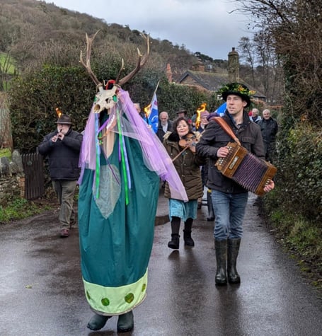 Allerford's Great Green Stag joins in the village wassail. PHOTO: Lisa Eden.