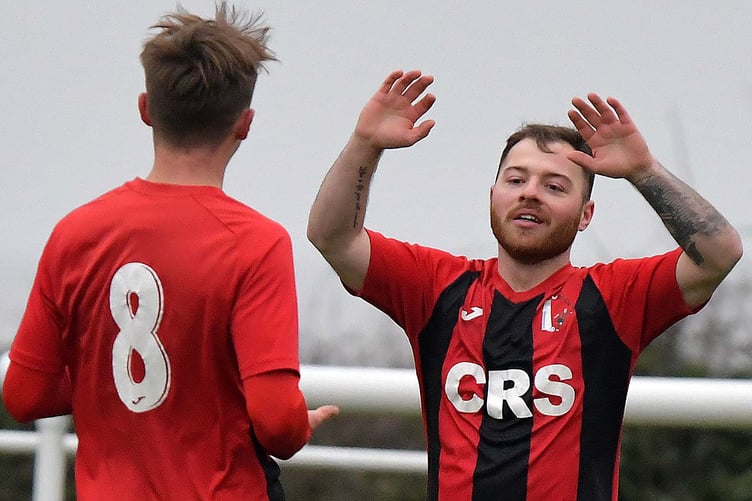 Riley Willis (8) celebrates Billy Jones' opening goal for Watchet