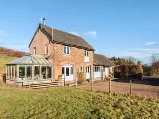Converted stone barn on 15-acres of farmland on the market for £775K
