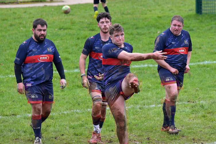 Charlie Sharland kicks a conversion for Wiveliscombe