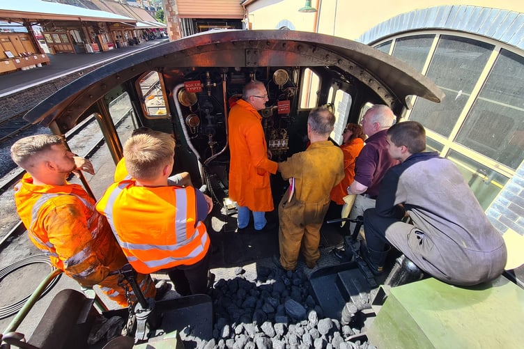 West Somerset Railway locomotive cleaning volunteers on the footplate of an engine. PHOTO: Aaron Manley.