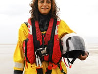 New lifeboat helm rescues two during final training session