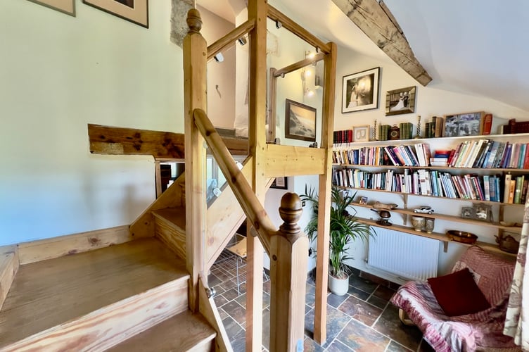 Gallery Hall with contemporary wood and glass staircase