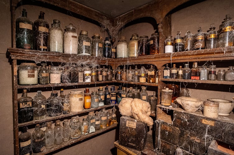 Inside the W.C.White Victorian Chemist time capsule display at Flambards, Cornwall. See SWNS story SWLNpharmacy. A Somerset pharmacy which was boarded up in the early 1900s remains almost exactly the same more than 100 years later - only now, it's in Cornwall.  The Victorian time capsule in South Petherton was discovered in the 1980s when the shop's then-owner Margaret White died. The shop had been shut since 1971, when Margaret had decided to close it rather than convert to using decimal coins. When the auctioneer went to have a look around in 1987, they discovered the back half of the shop was entirely sealed off.