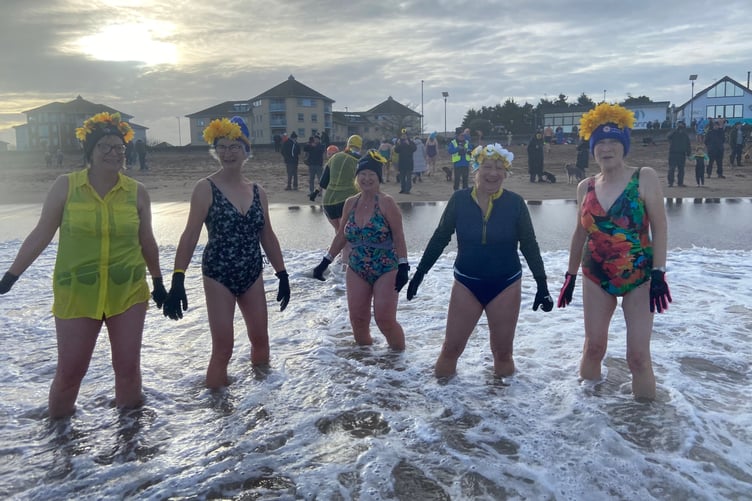 Minehead Mermaids swimmers take part last year in the St Margaret's Hospice New Year dip.