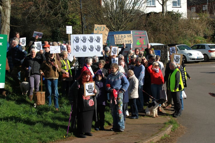 Protestors made their opposition known to proposals to end free car parking in Wiveliscombe. PHOTO: George Ody.