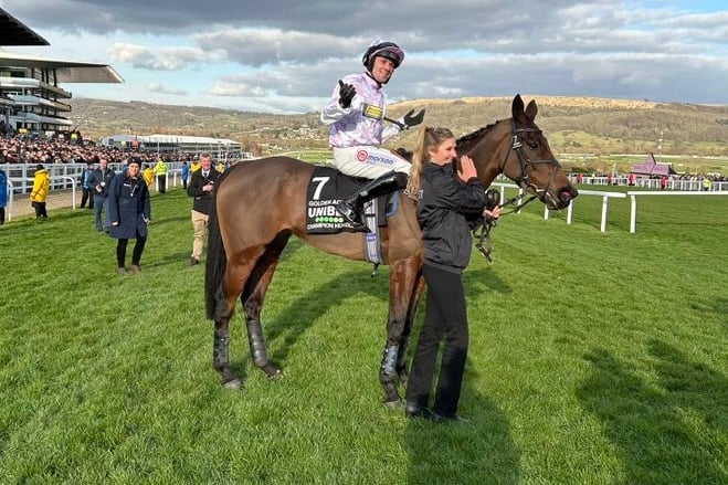 Jockey Lorcan Williams and Emily Meek pictured with Golden Ace straight after winning the Unibet Champion Hurdle at Cheltenham.