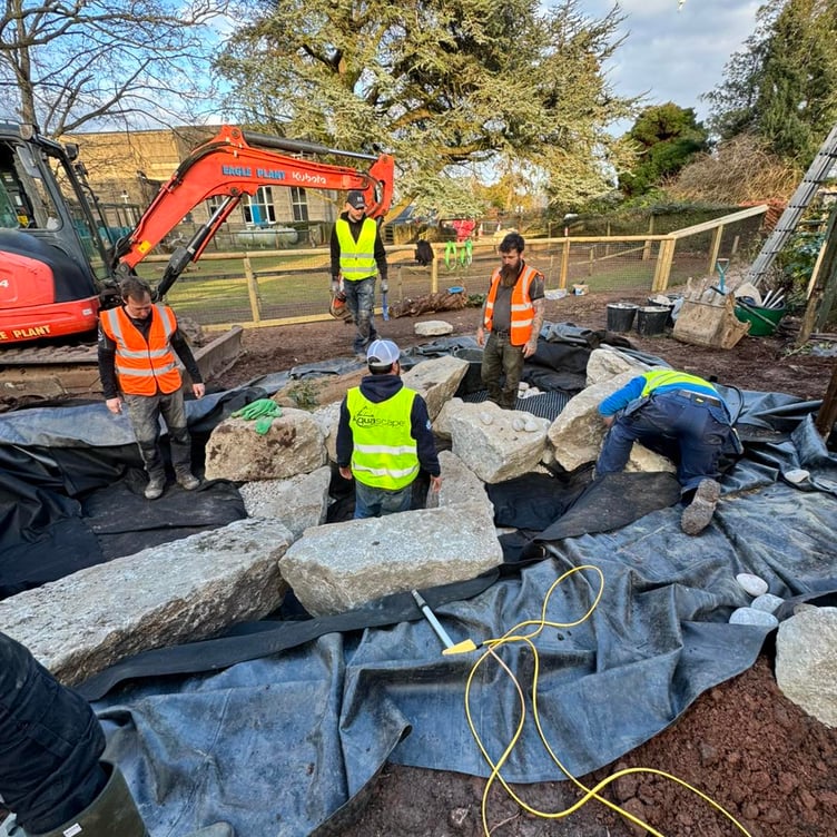 Specialist aquatic landscape workers have been helping to create a new enclosure in Tropiquaria Zoo, near Watchet, for bobcat Bode.