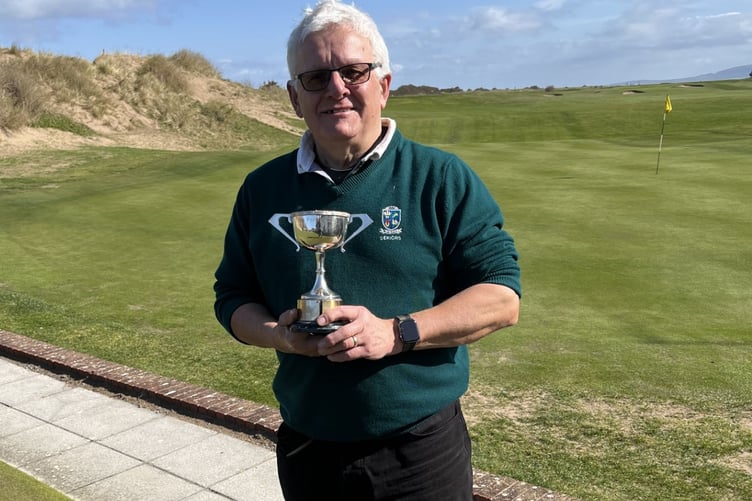 Andrew Coward with the cup