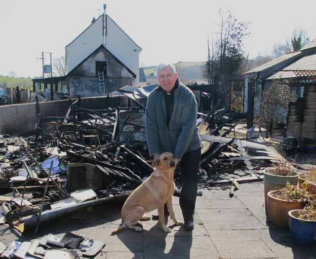 Vicar's dog saved as blaze damages houses