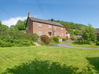 Five bedroom farmhouse with beautiful surroundings is on the market