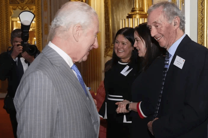 Free Press reporter Tony James meets King Charles at a Buckingham Palace reception. PHOTO: PA.
