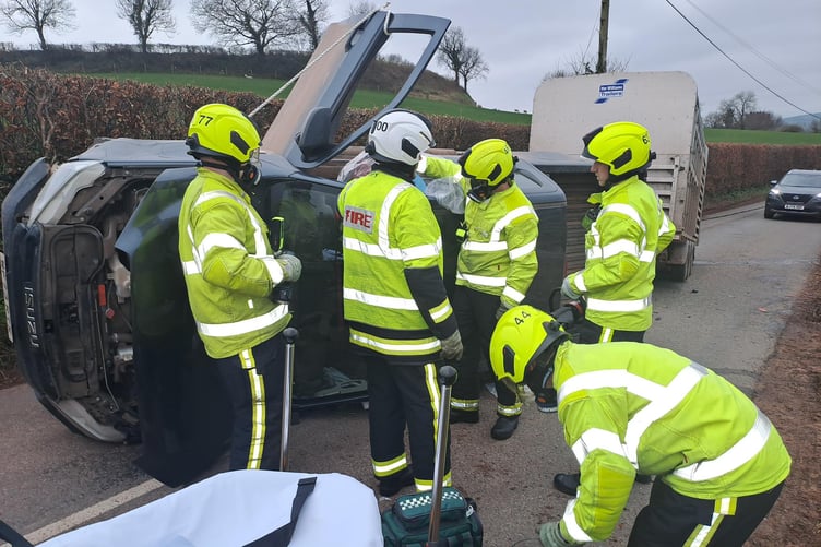 Fire crews rescued a driver from this overturned vehicle in Wiveliscombe. PHOTO: DSFR.