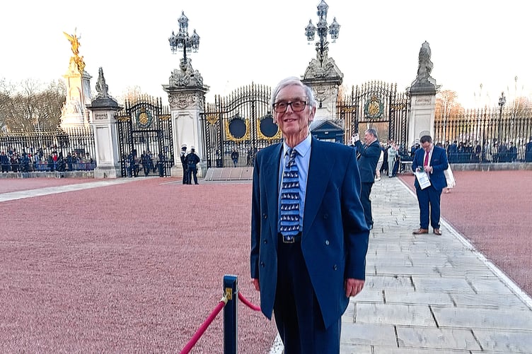 Free Press reporter Tony James entering Buckingham Palace to meet the King.