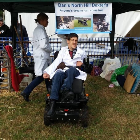 Cerebral palsy sufferer Dan Sully takes his Dexter cattle to Dunster Show.
