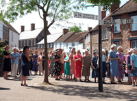 Village women walking to keep centuries old tradition alive