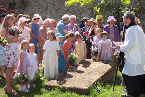 Stowey Female Friendly Society walkers at the grave of Thomas Poole. PHOTO: Quantock Online.