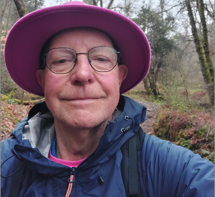 'Pink Hat Man' Chris Stanbury pictured walking through West Somerset this week.